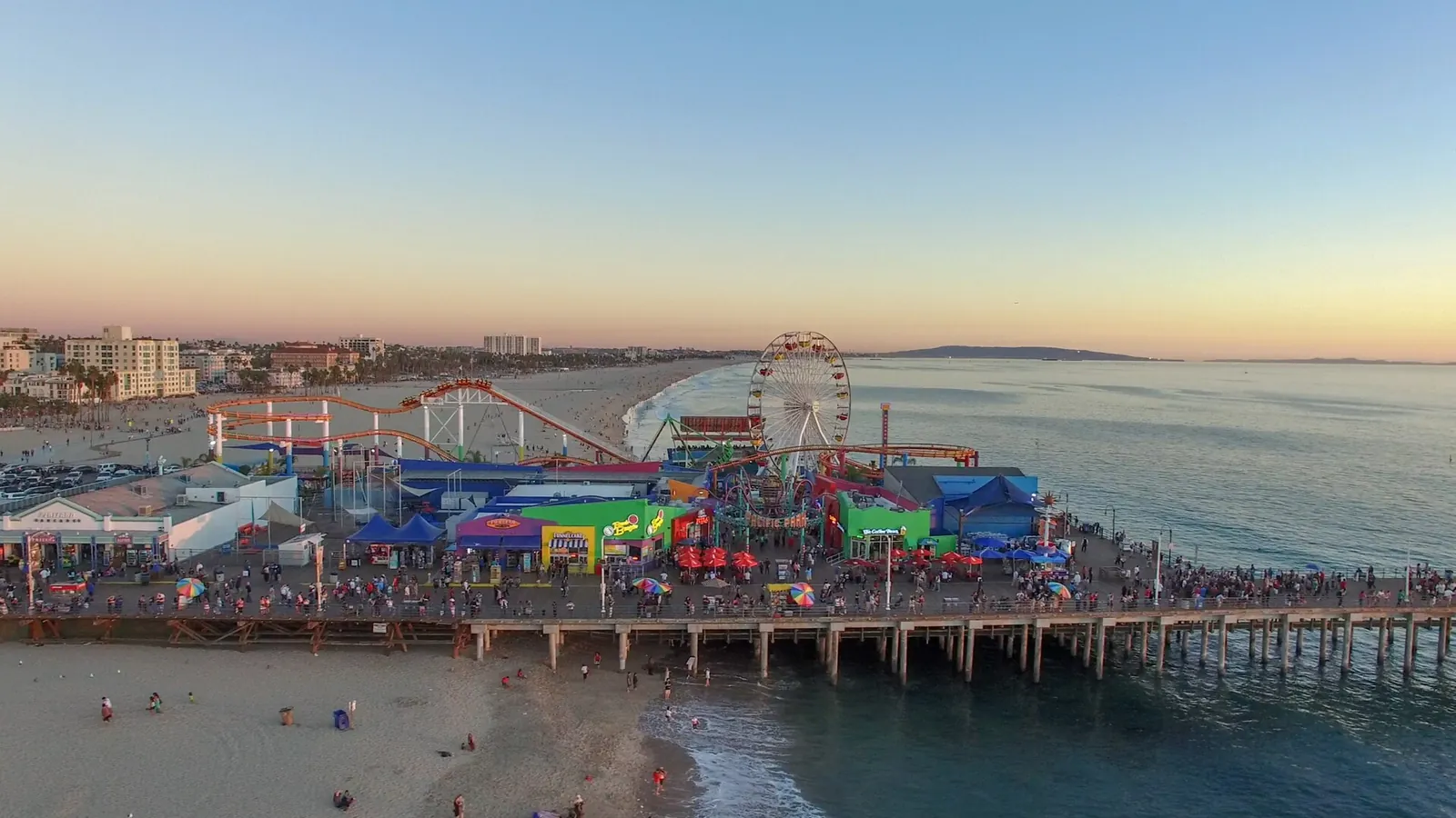 Santa Monica Pier and its Ferris wheel at golden hour