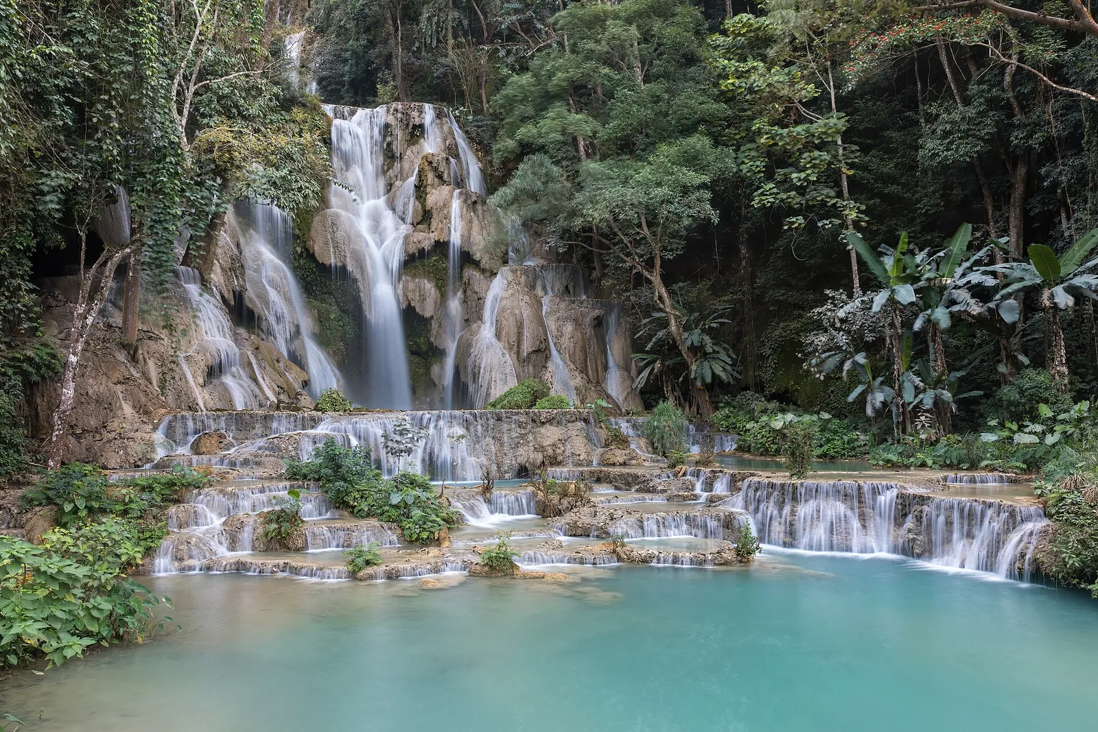 Kuang Si Falls tumbling into turquoise pools