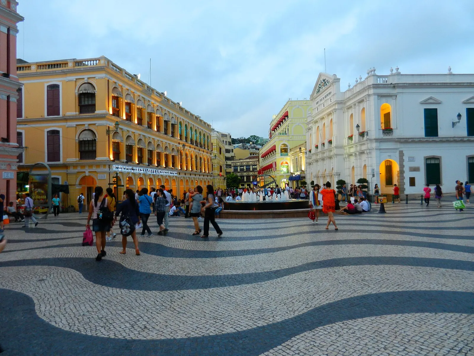 Wavy paving and pastel facades on Senado Square