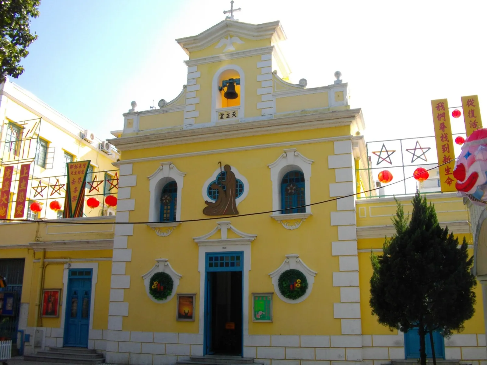 The yellow Chapel of St. Francis Xavier in Coloane Village