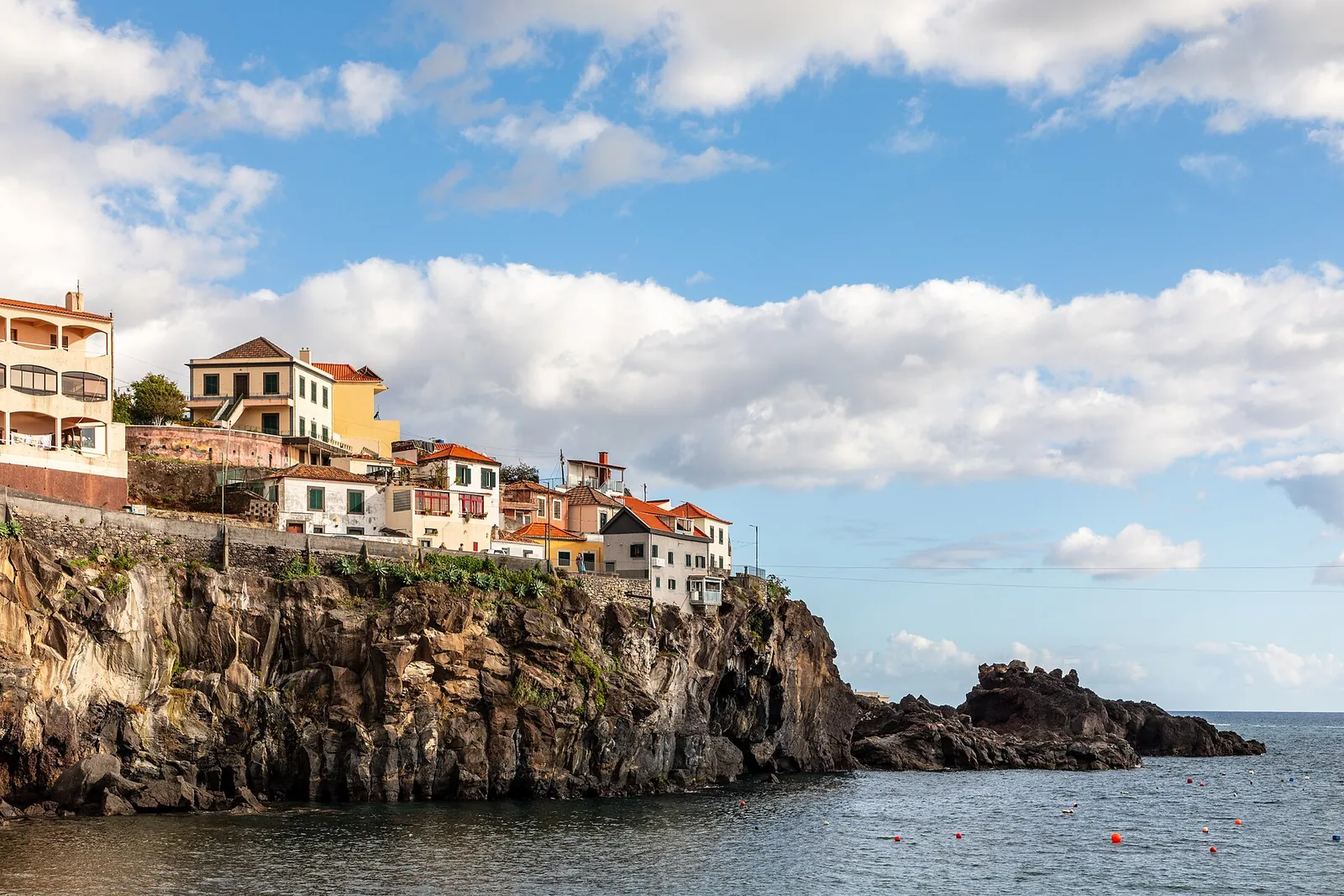 Houses perched on the cliffs of Câmara de Lobos
