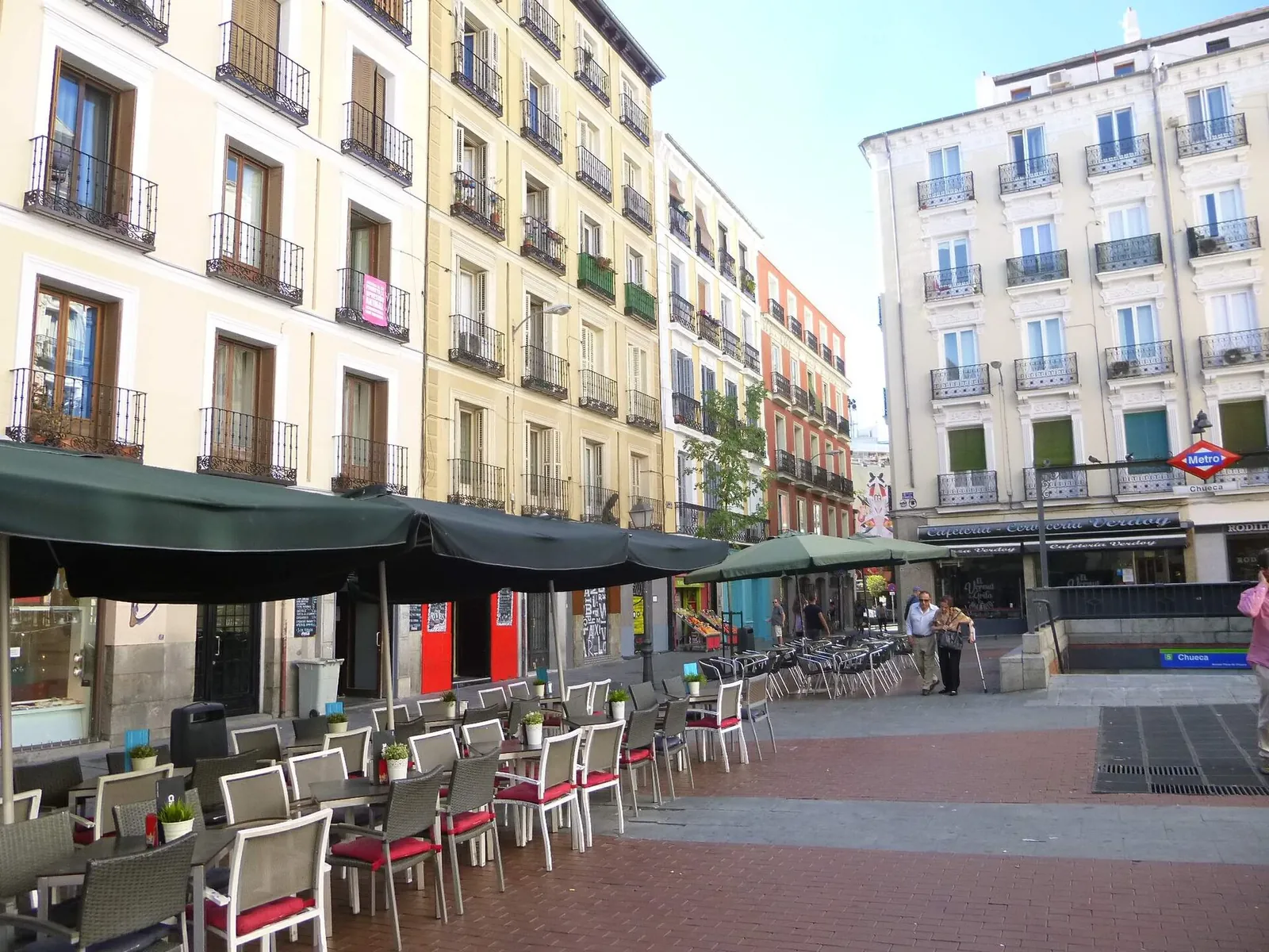 Café terraces on sunny Plaza de Chueca