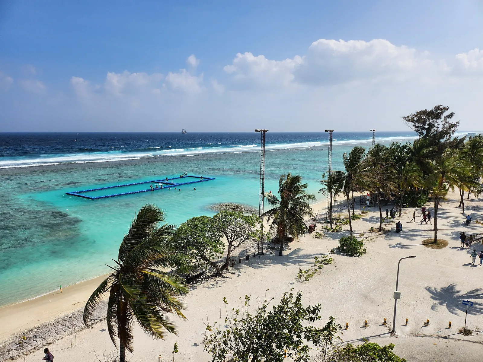Palm-lined beachfront in Hulhumalé under blue sky