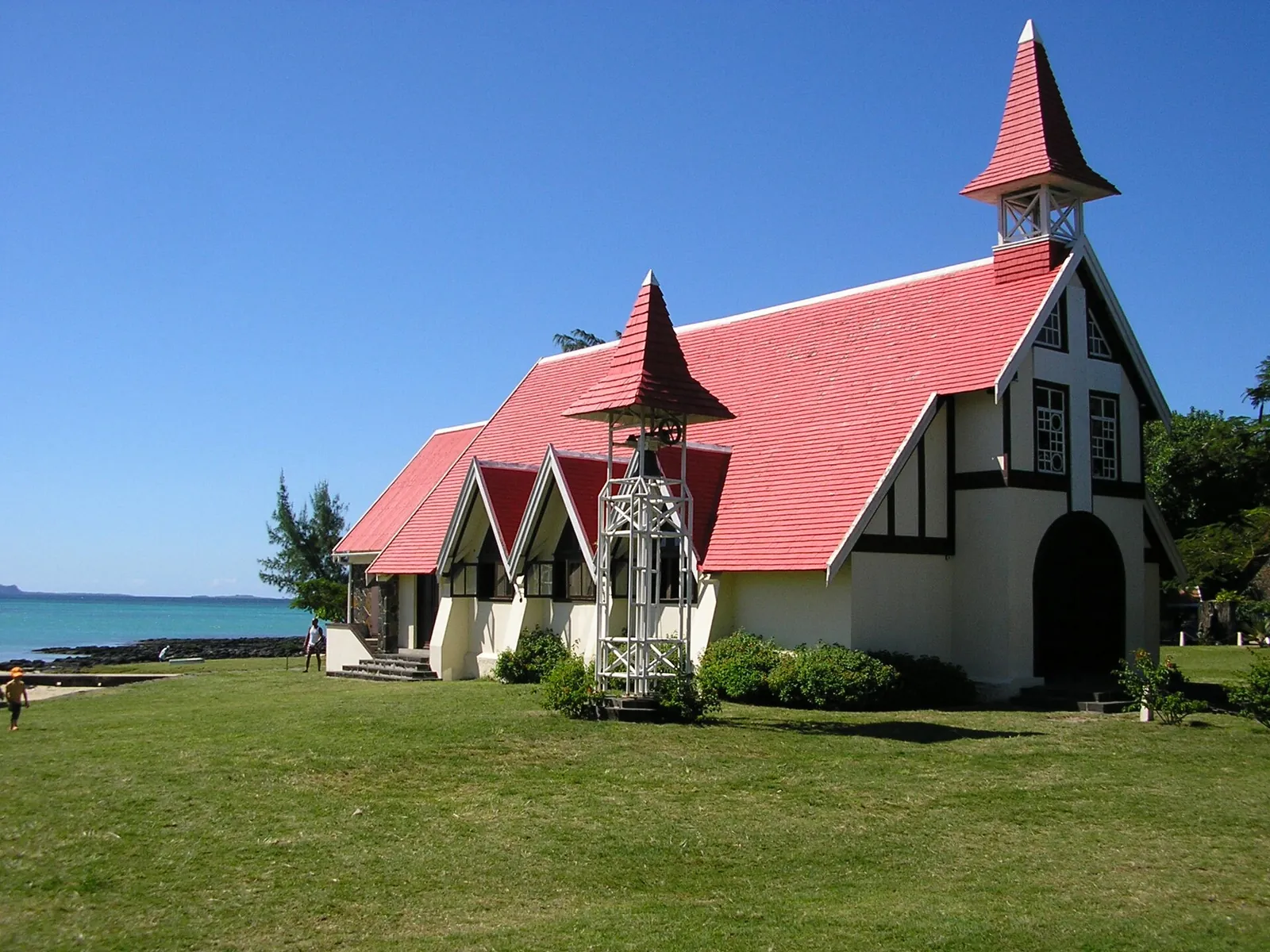 The red-roofed chapel at Cap Malheureux by the sea