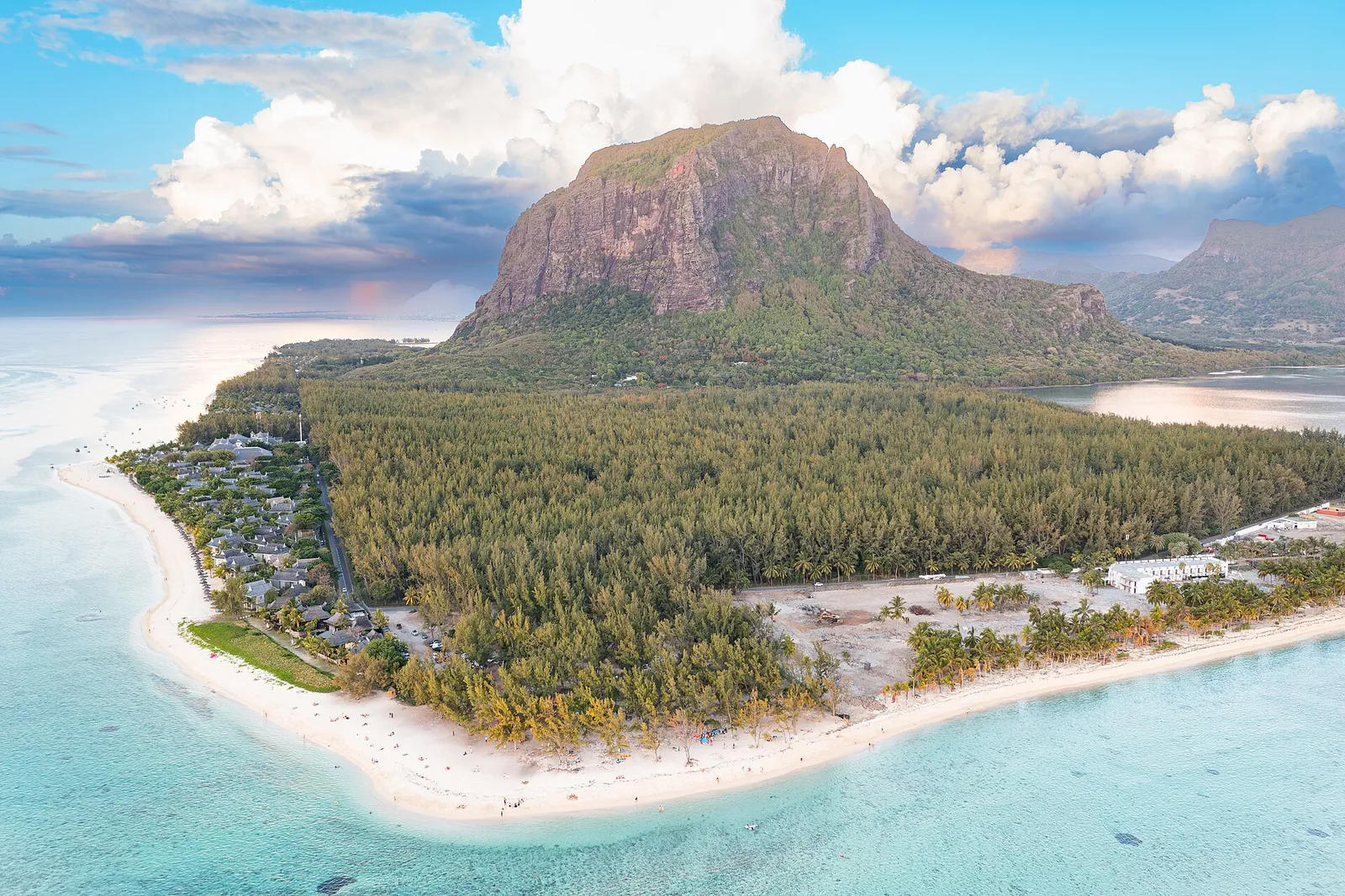 Le Morne Brabant rising above turquoise lagoon and white beach
