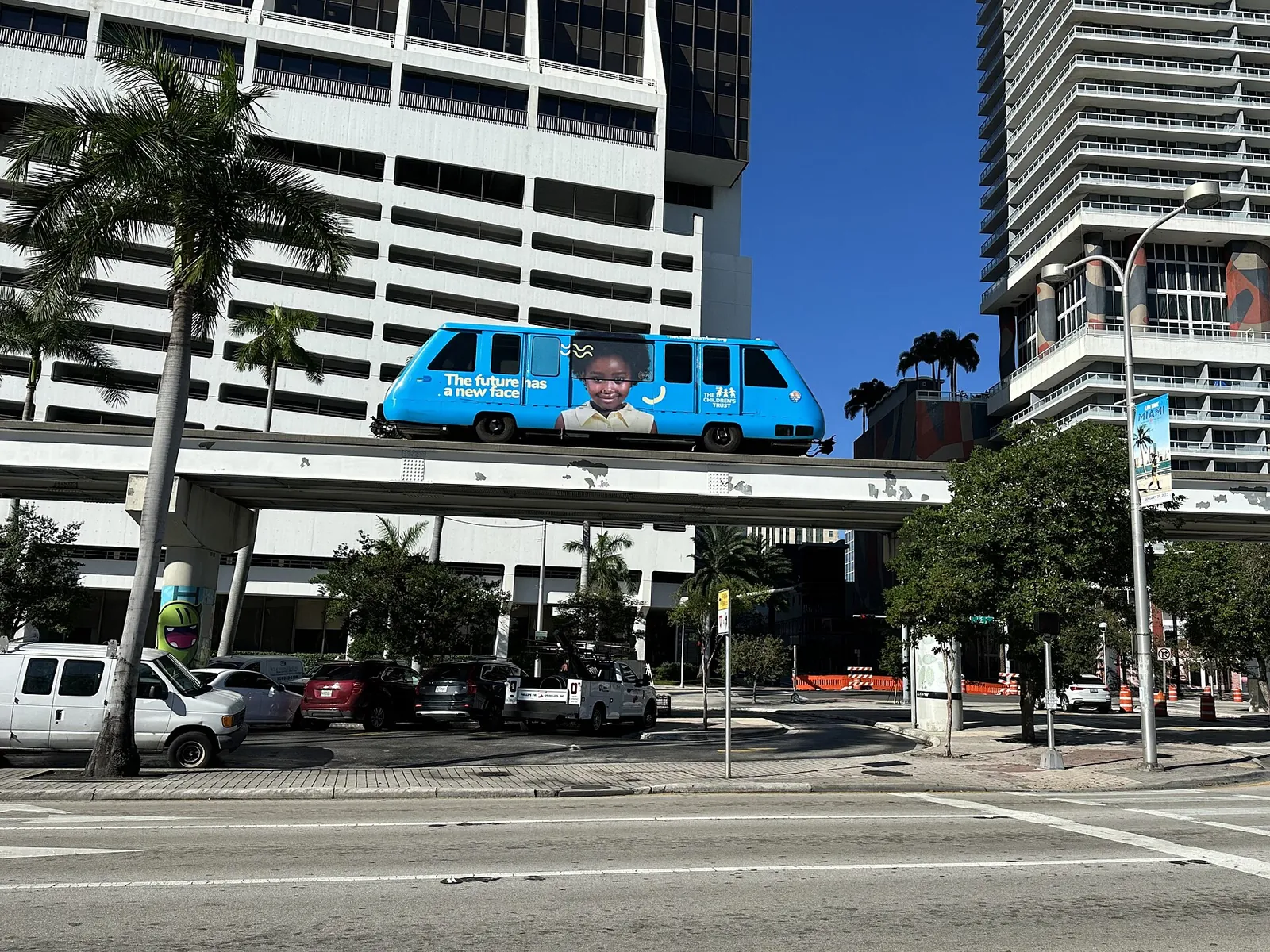 A free Metromover car rolling through Downtown Miami