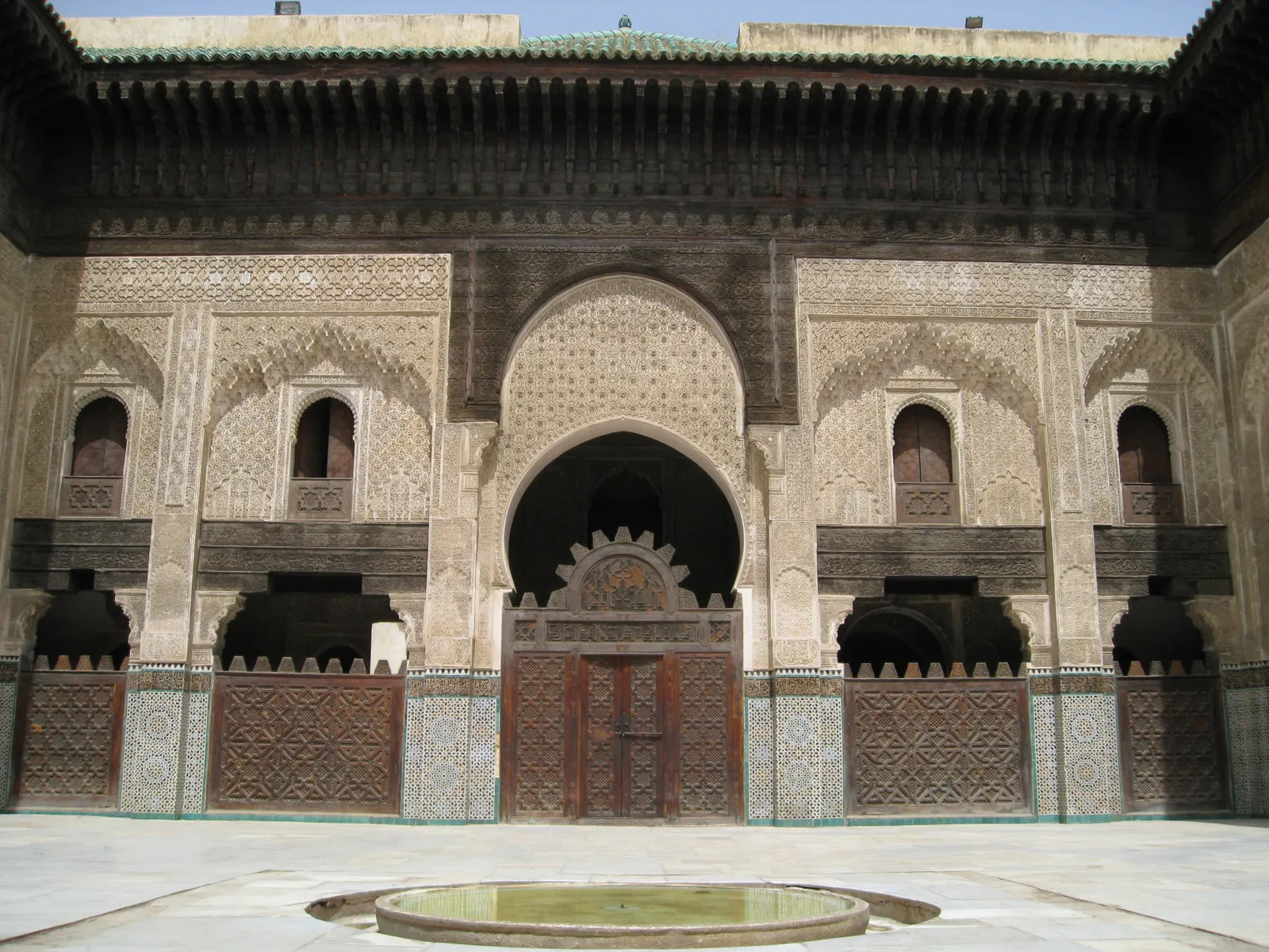 Carved courtyard of the Bou Inania Madrasa in Fes