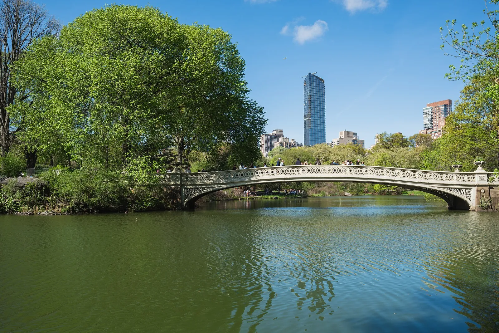Bow Bridge over the Lake in green Central Park