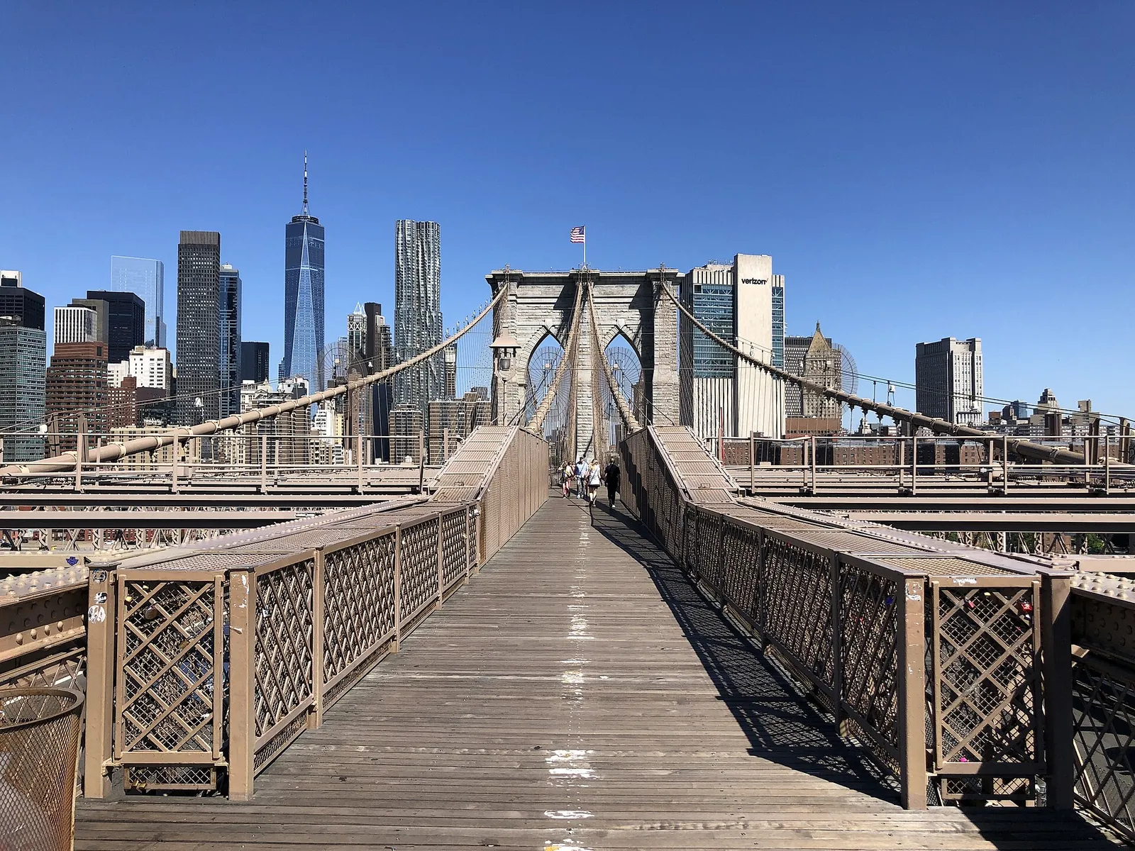 Brooklyn Bridge walkway leading to the Manhattan skyline