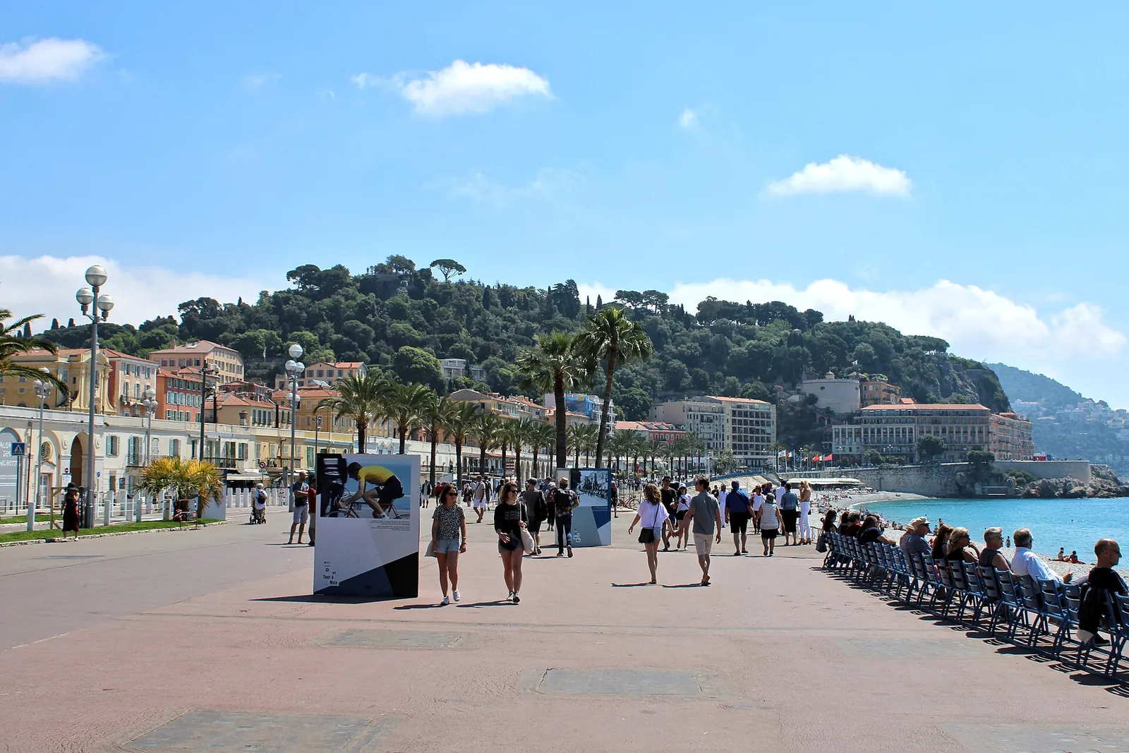 Strolling the palm-lined Promenade des Anglais