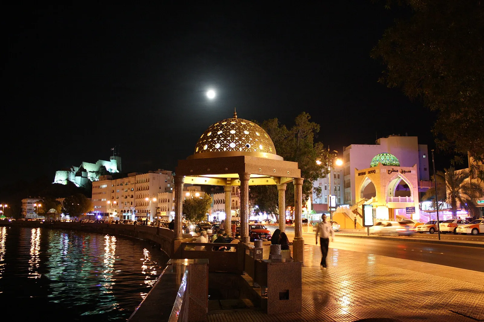 The Mutrah corniche glowing under the moon
