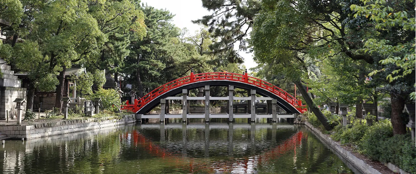 The arched red Sorihashi Bridge at Sumiyoshi Taisha