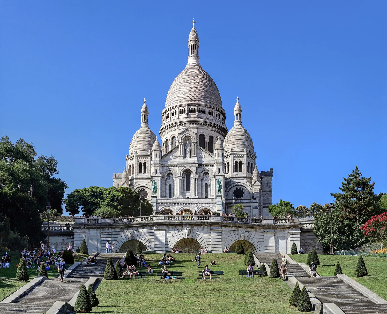 White domes of Sacré-Cœur on a sunny day