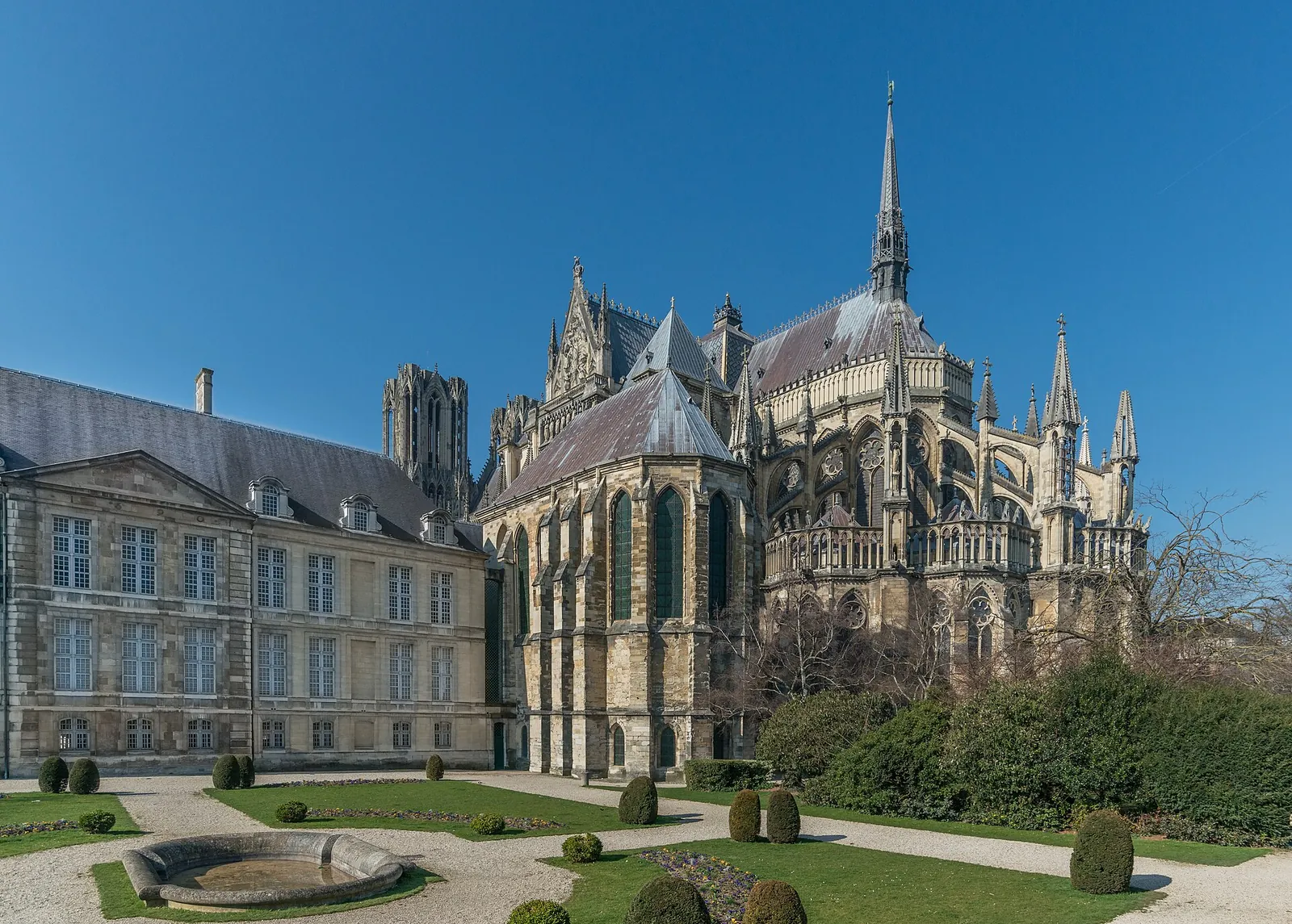 Reims Cathedral and the Palais du Tau under blue sky