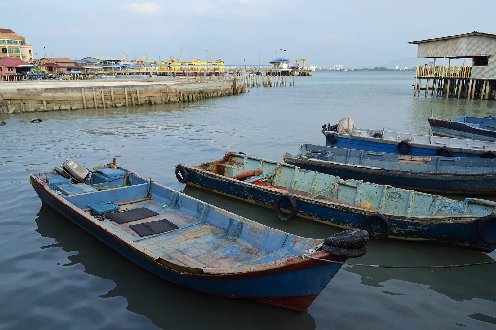 Fishing boats moored at Chew Jetty, Weld Quay