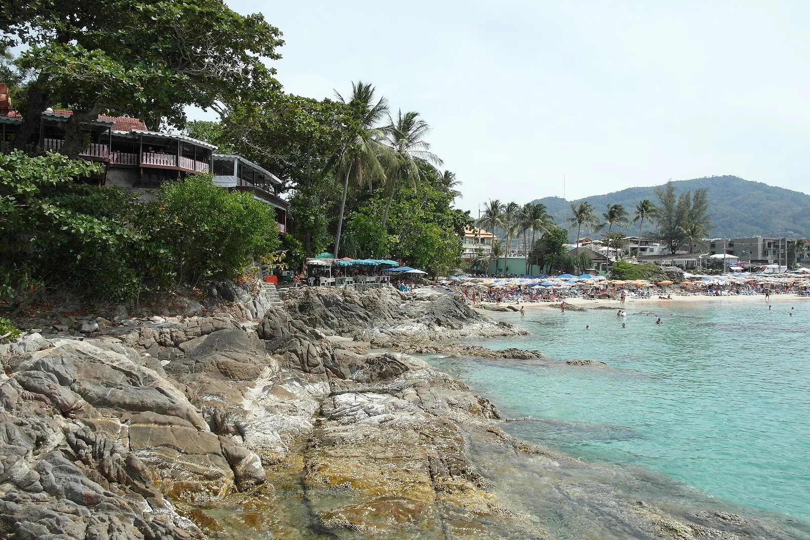 Turquoise water and rocks at Patong Beach