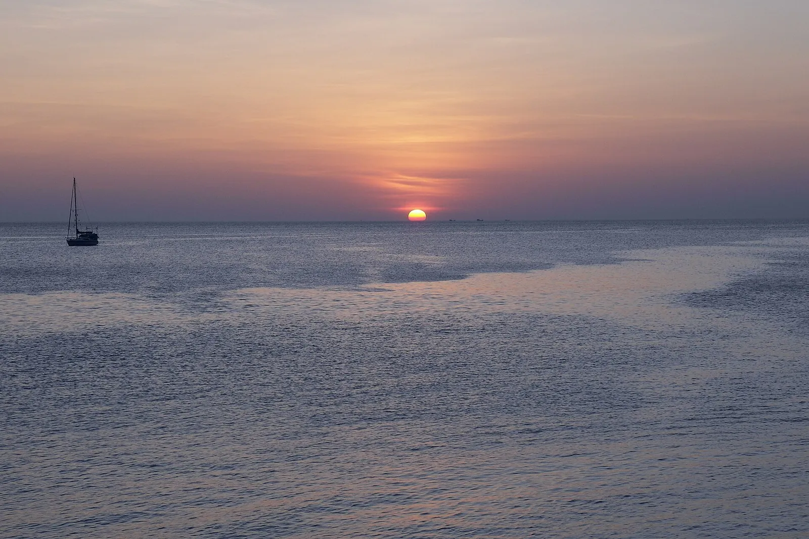 Sun setting over the Andaman Sea off Patong