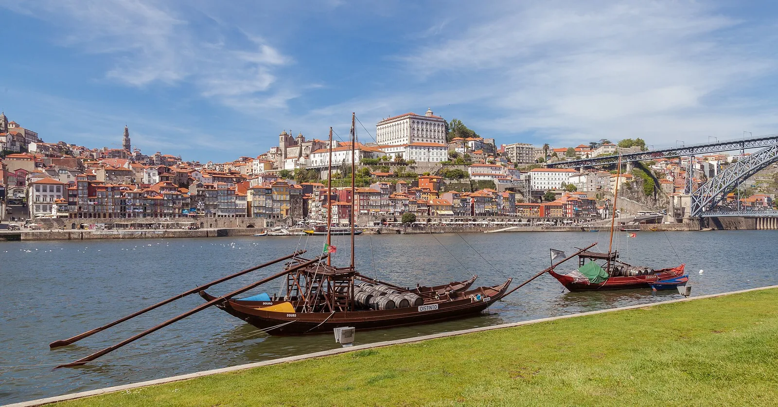 Rabelo boats on the Douro with Porto behind