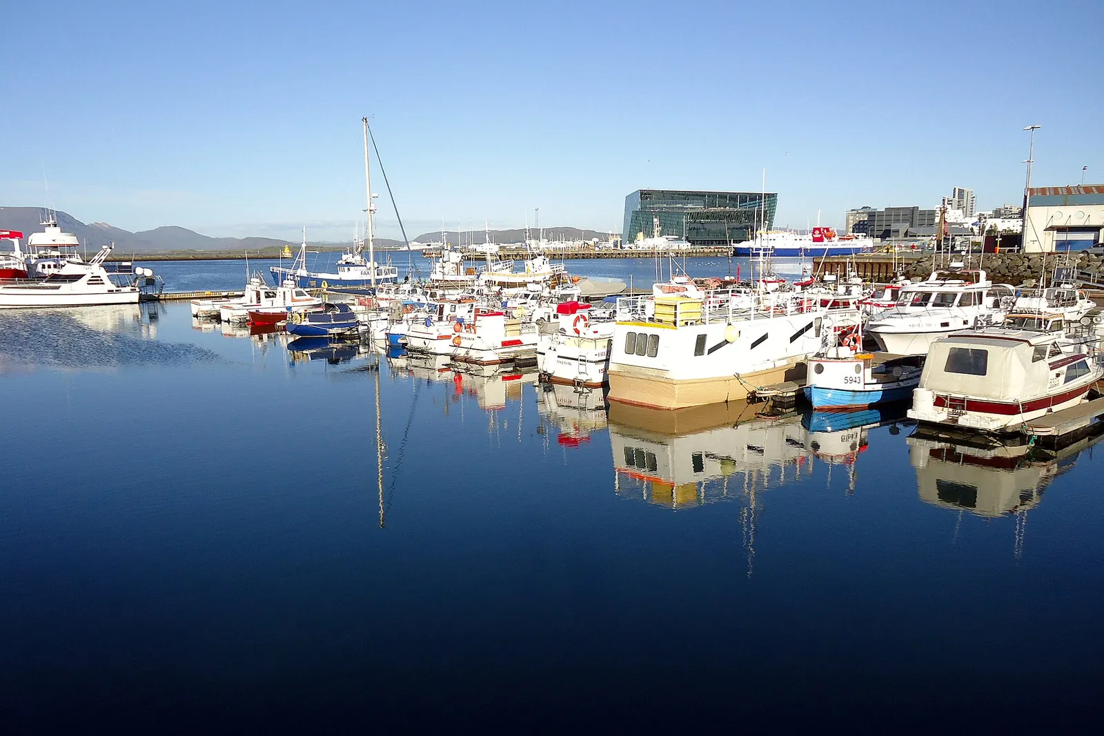 Boats reflected in the calm Old Harbour