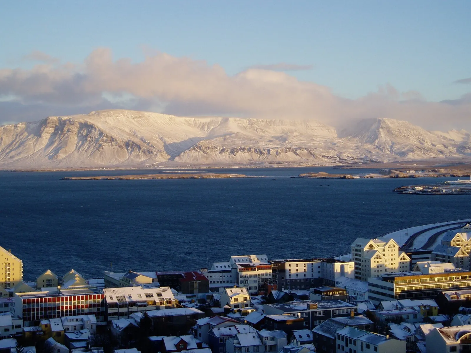 Snow-capped mountains across the bay from Reykjavik