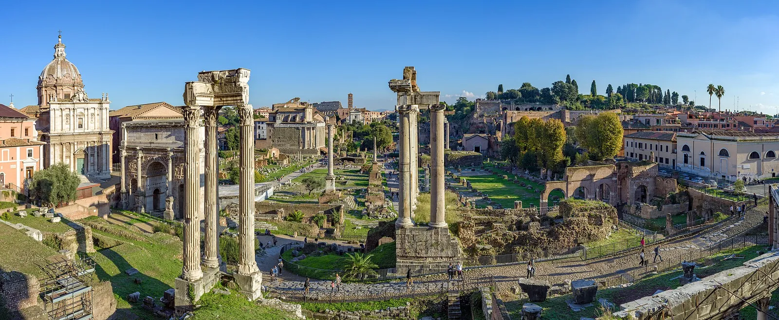 Columns and temples of the Roman Forum in sunshine