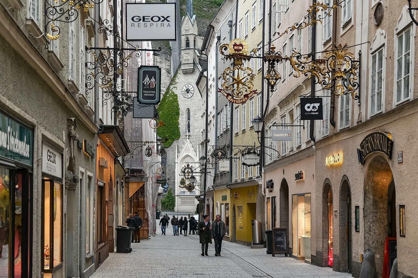 Wrought-iron shop signs along the Getreidegasse