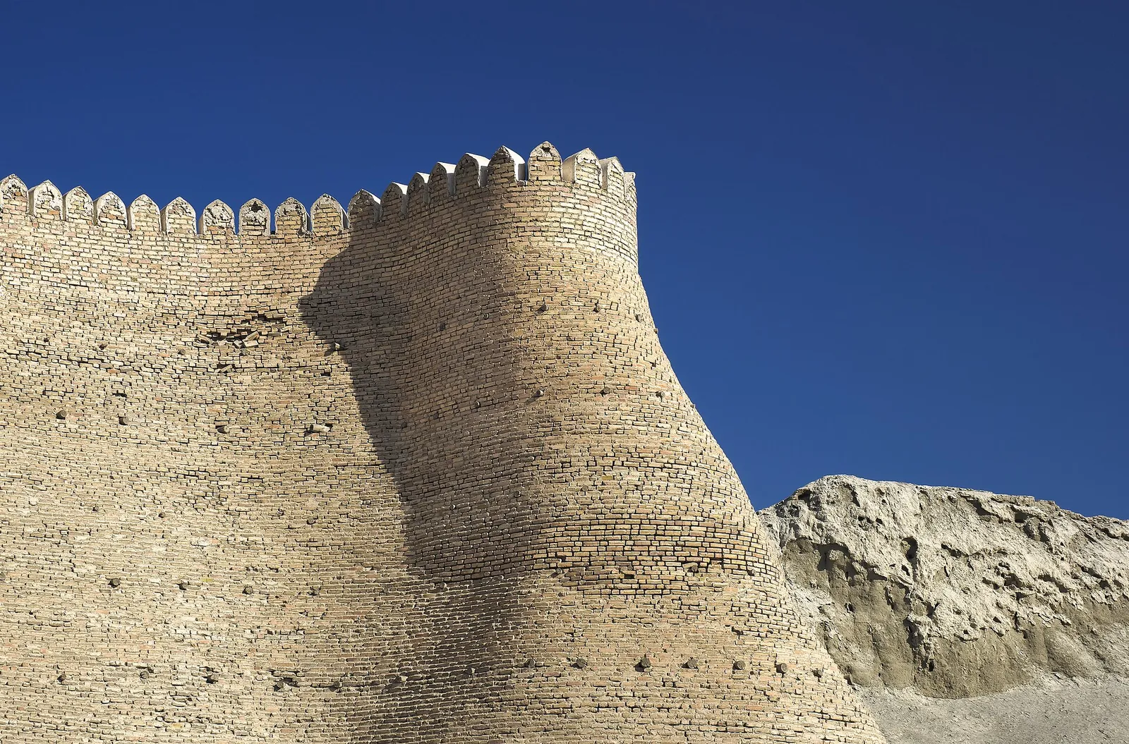 The massive sloping walls of Bukhara's Ark Citadel