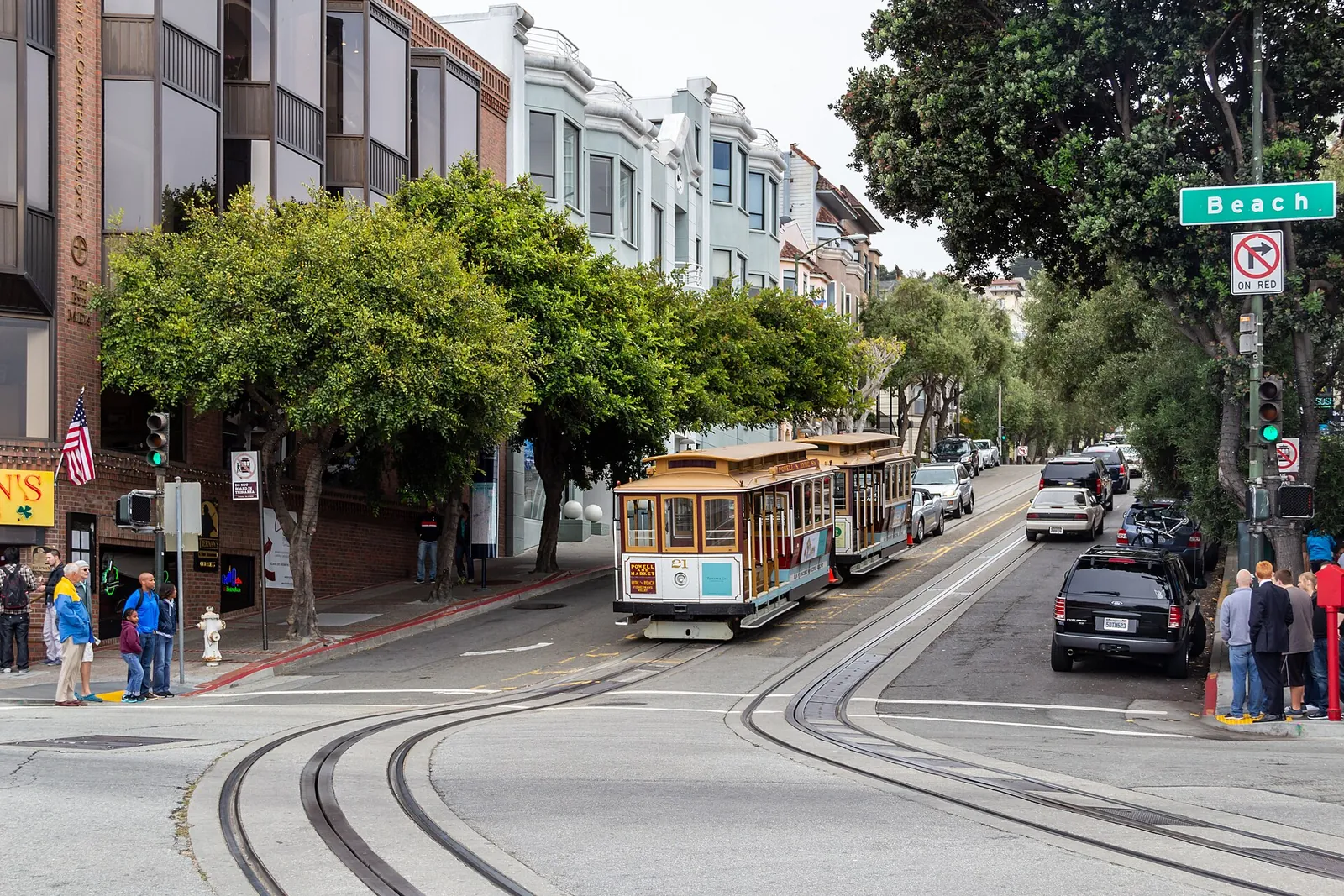 A cable car climbing Hyde Street near Beach Street