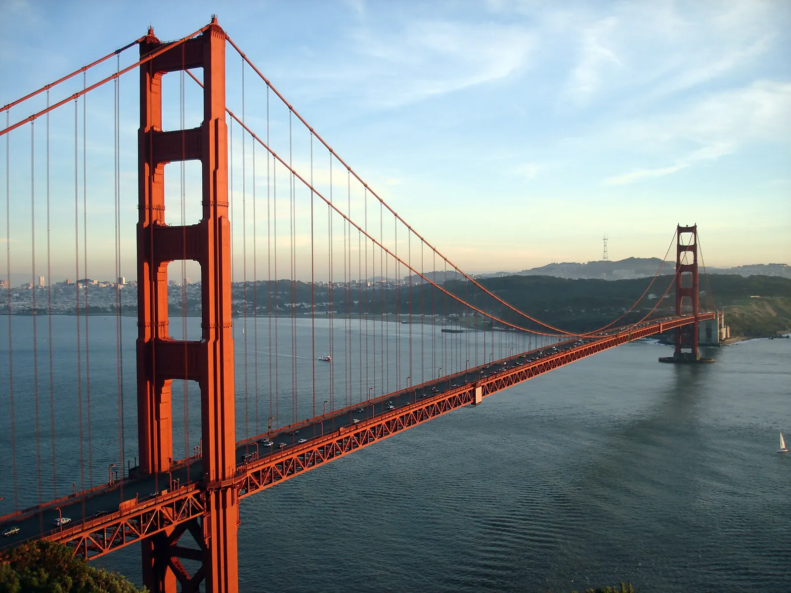 The Golden Gate Bridge's red towers above the bay