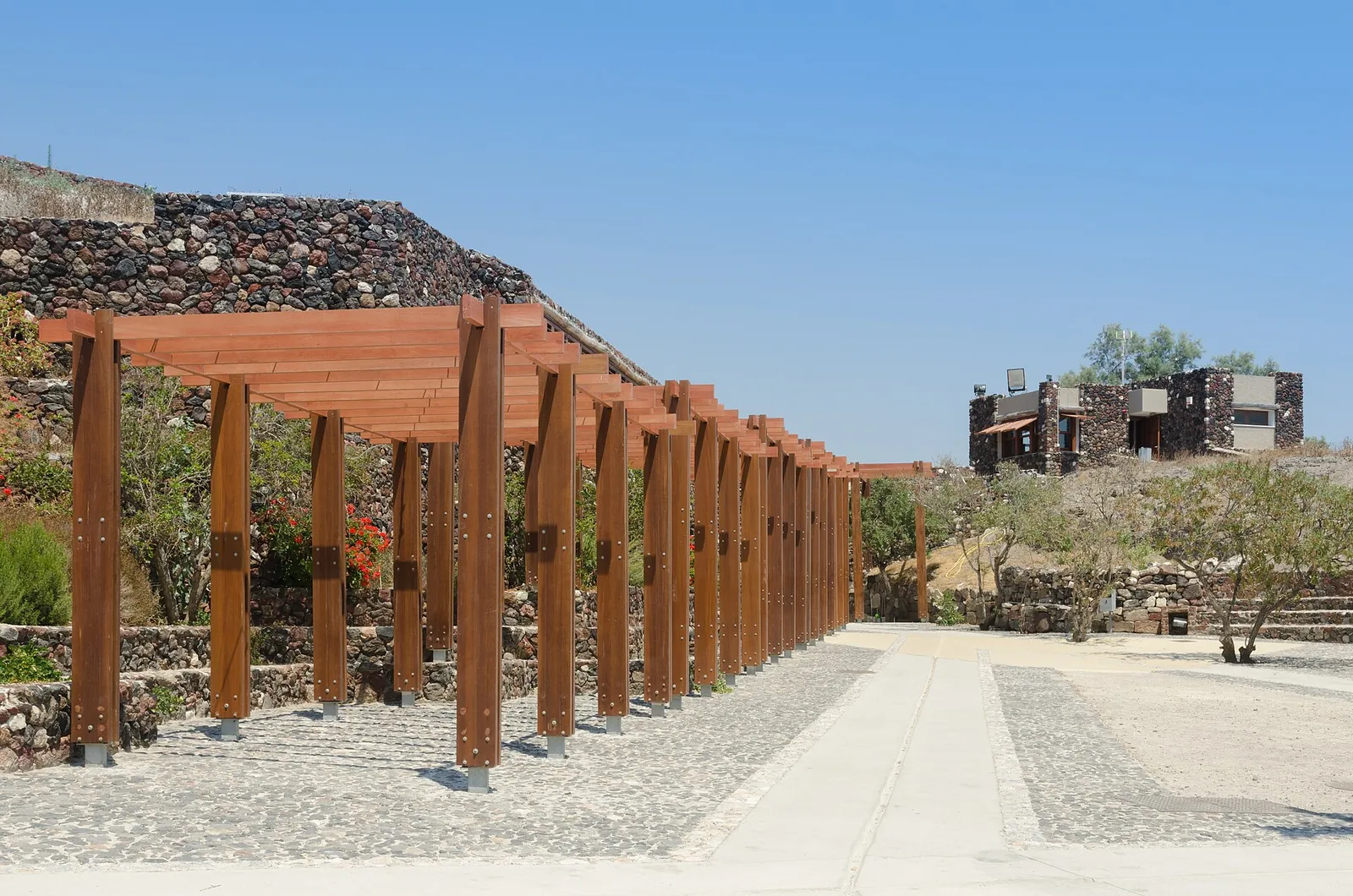 Sunny entrance path to the Akrotiri archaeological site