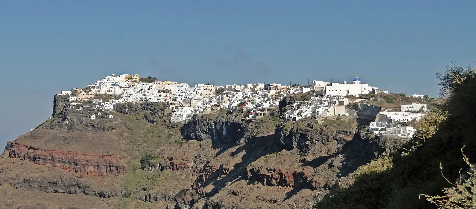 Imerovigli and Fira strung along the caldera rim