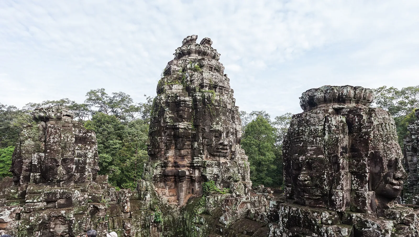 Smiling stone faces on the towers of the Bayon