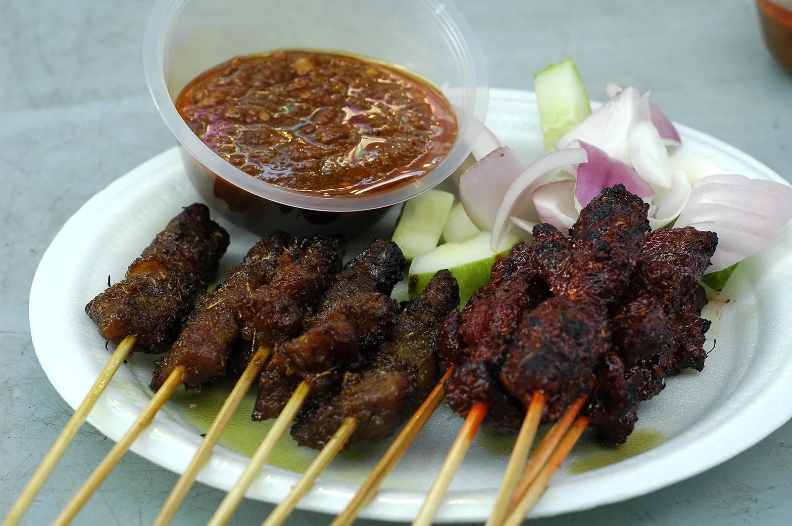 Satay skewers with peanut sauce in Singapore