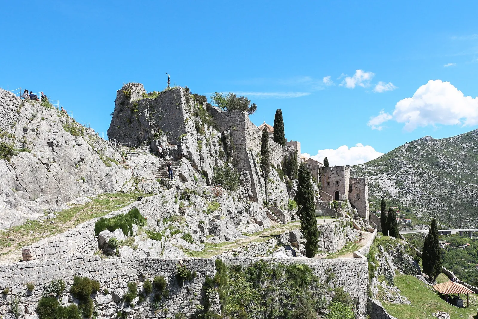 Klis Fortress climbing a rocky ridge above Split