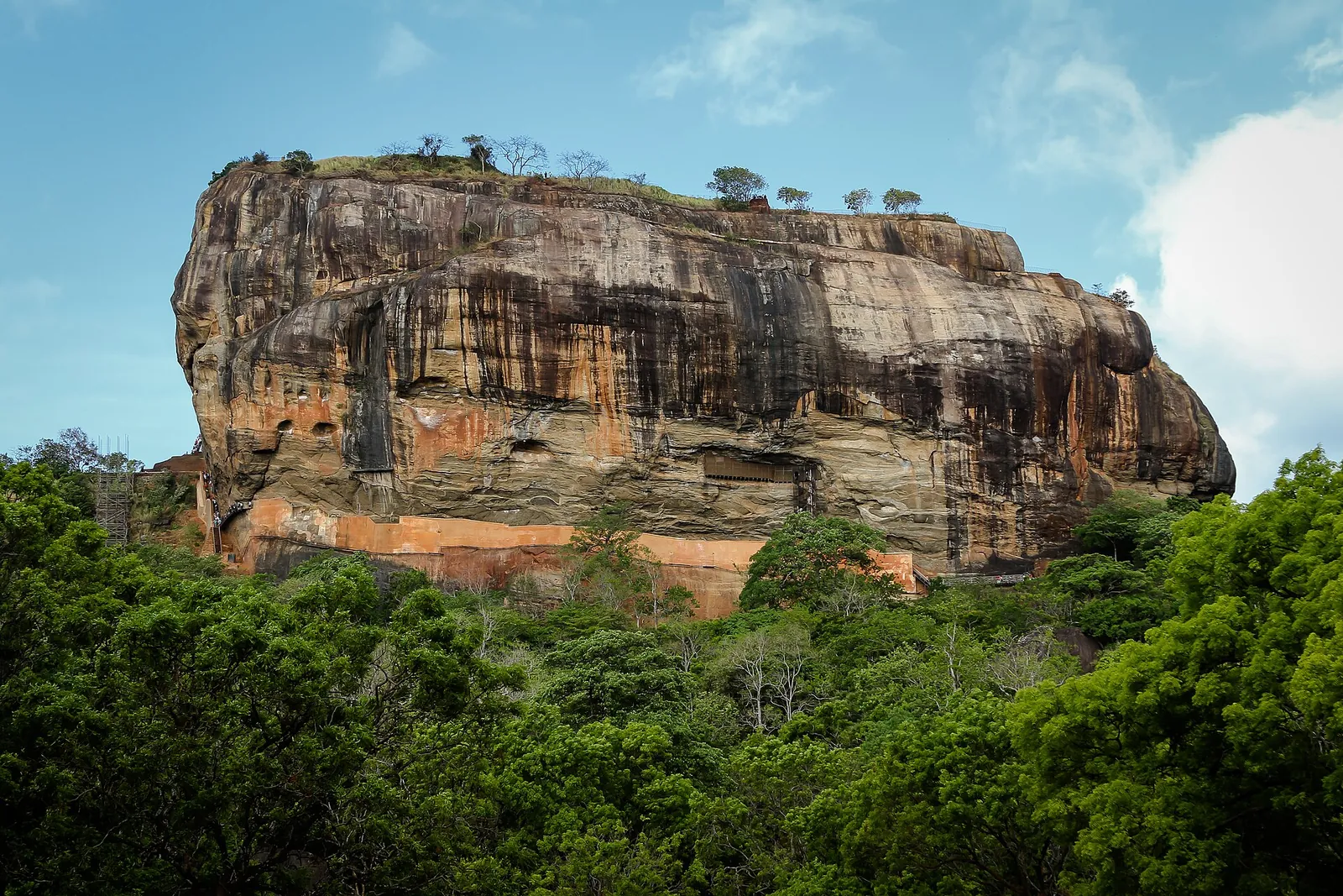 Sigiriya's Lion Rock rising above green jungle