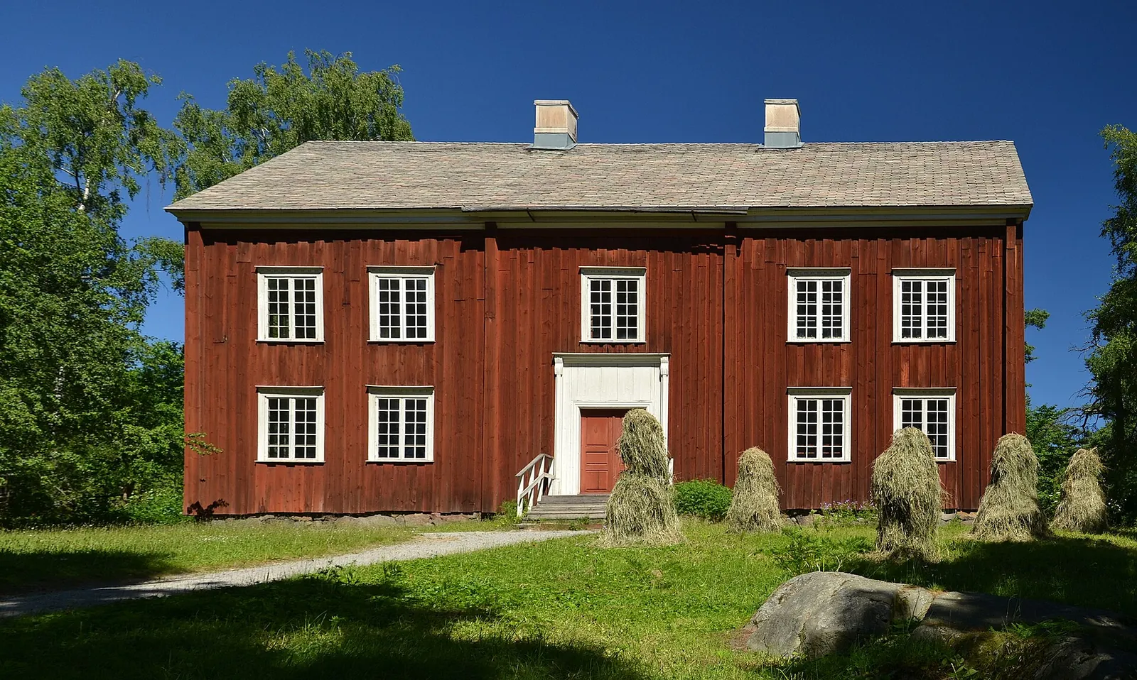 Red timber farmhouse at the Skansen open-air museum