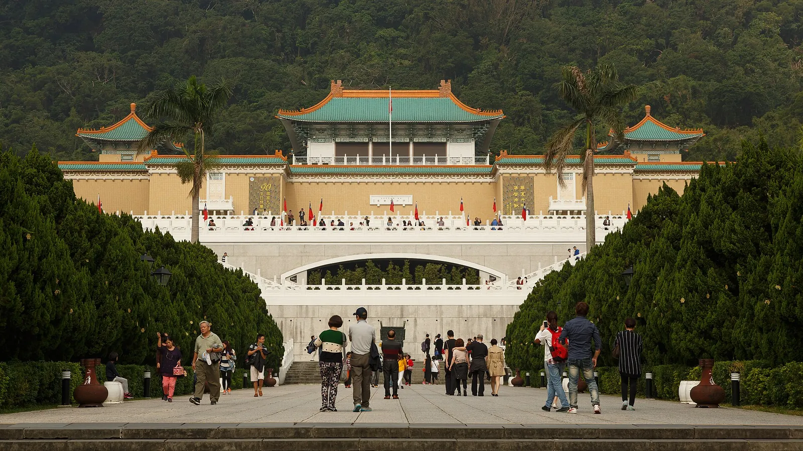 The National Palace Museum against green hills