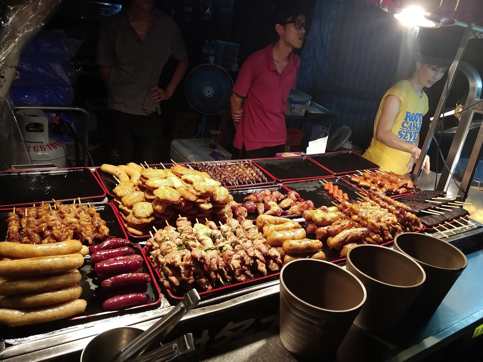 Grilled skewers and sausages at Shilin Night Market