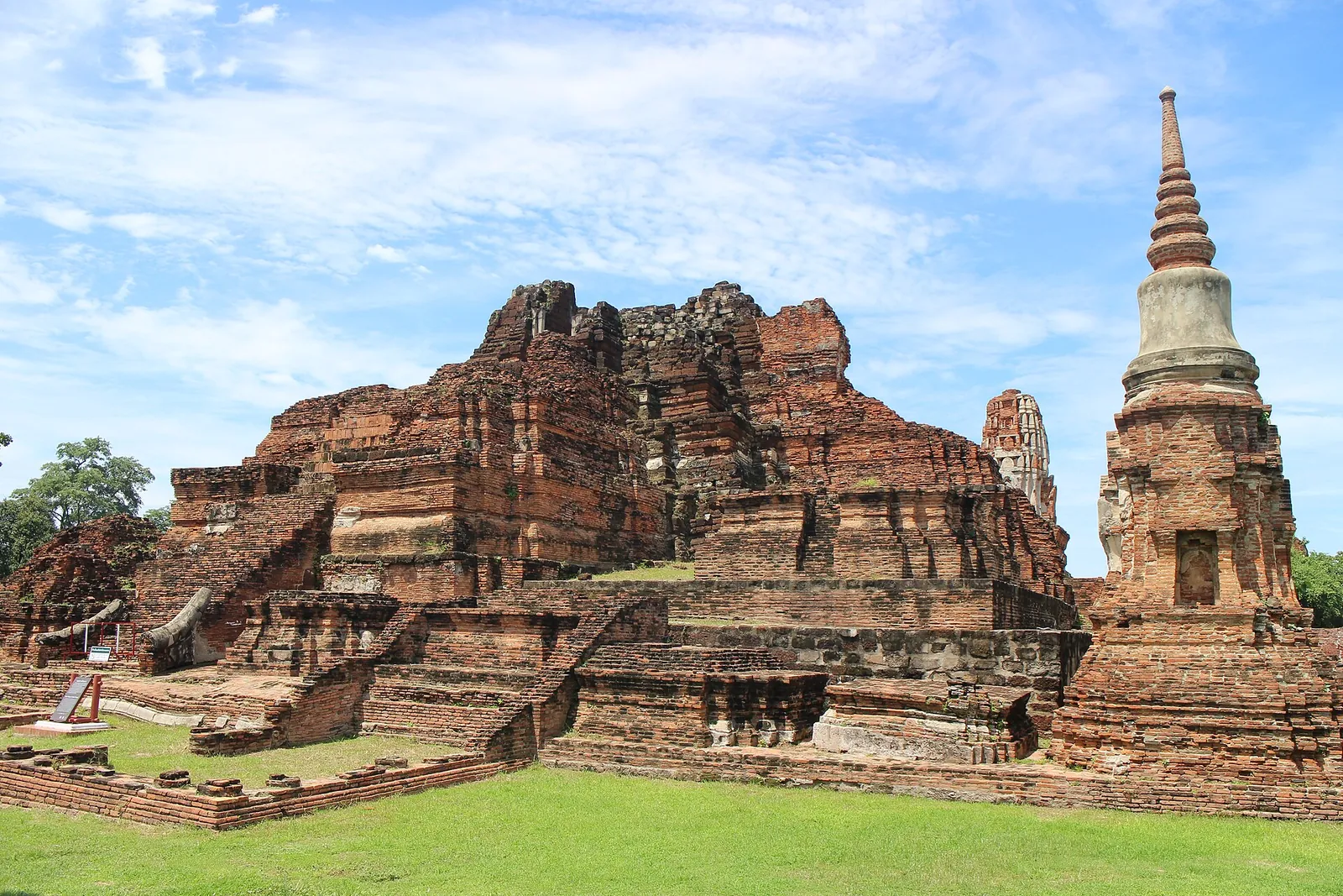 Brick ruins of Wat Mahathat under blue sky, Ayutthaya