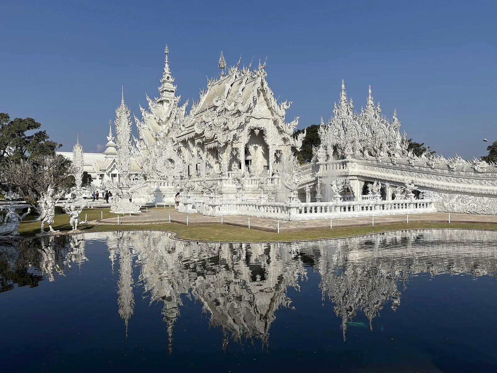 The White Temple reflected in its pond, Chiang Rai
