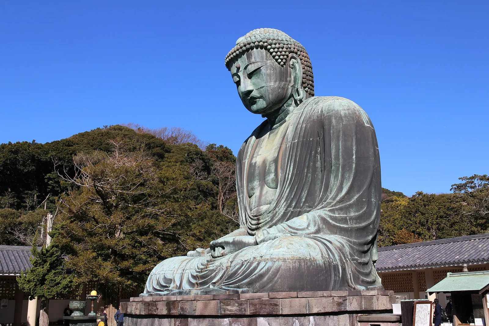The bronze Great Buddha of Kamakura under a blue sky