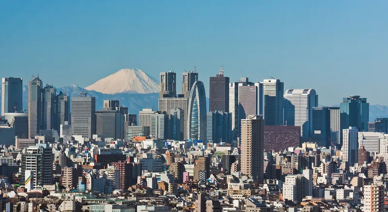 Shinjuku skyscrapers with snowy Mt Fuji behind
