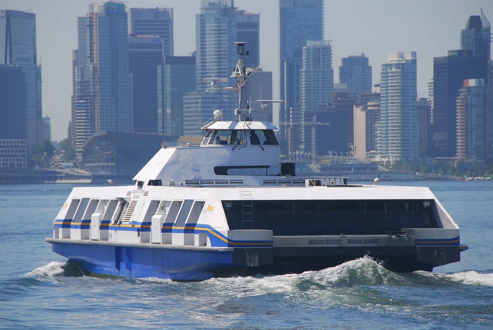 The SeaBus crossing Burrard Inlet below the downtown towers