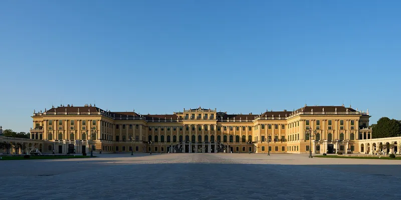Schönbrunn Palace under a bright blue sky