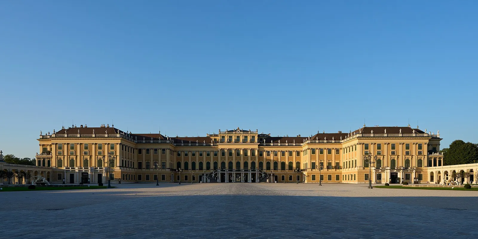 Schönbrunn Palace under a bright blue sky