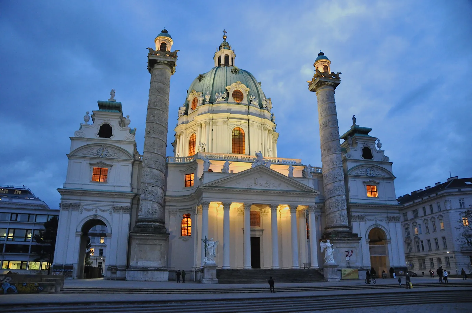 Karlskirche's dome lit up at dusk