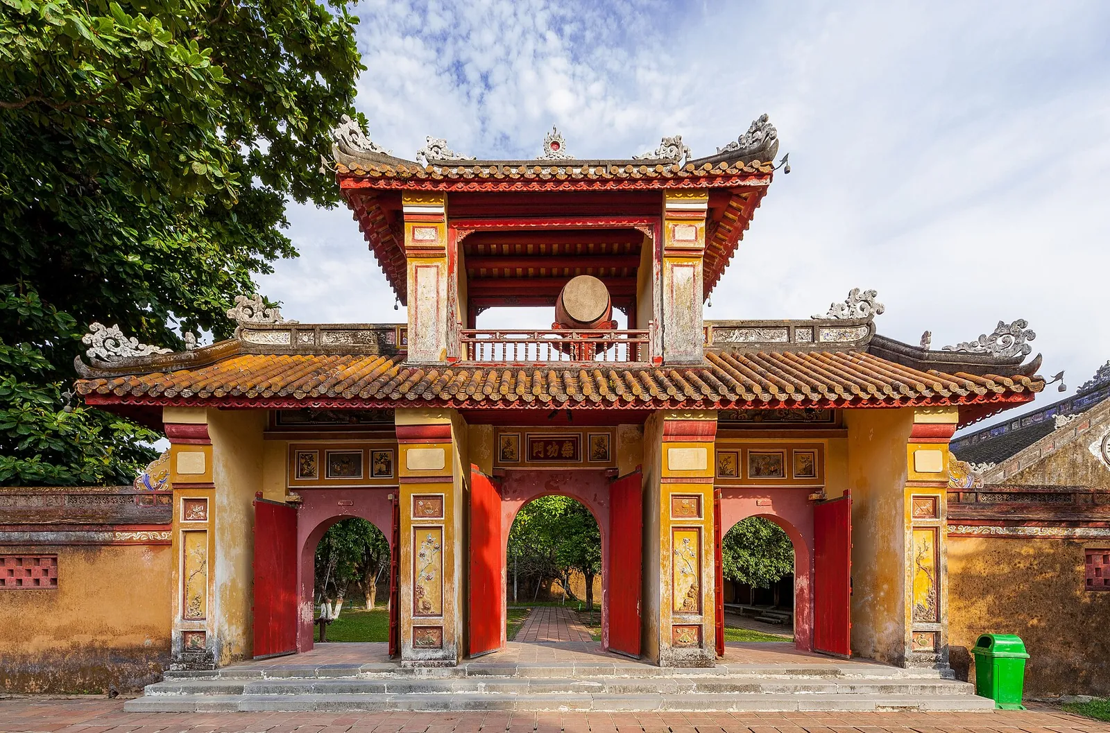 A red and gold gate inside Hue's Imperial City