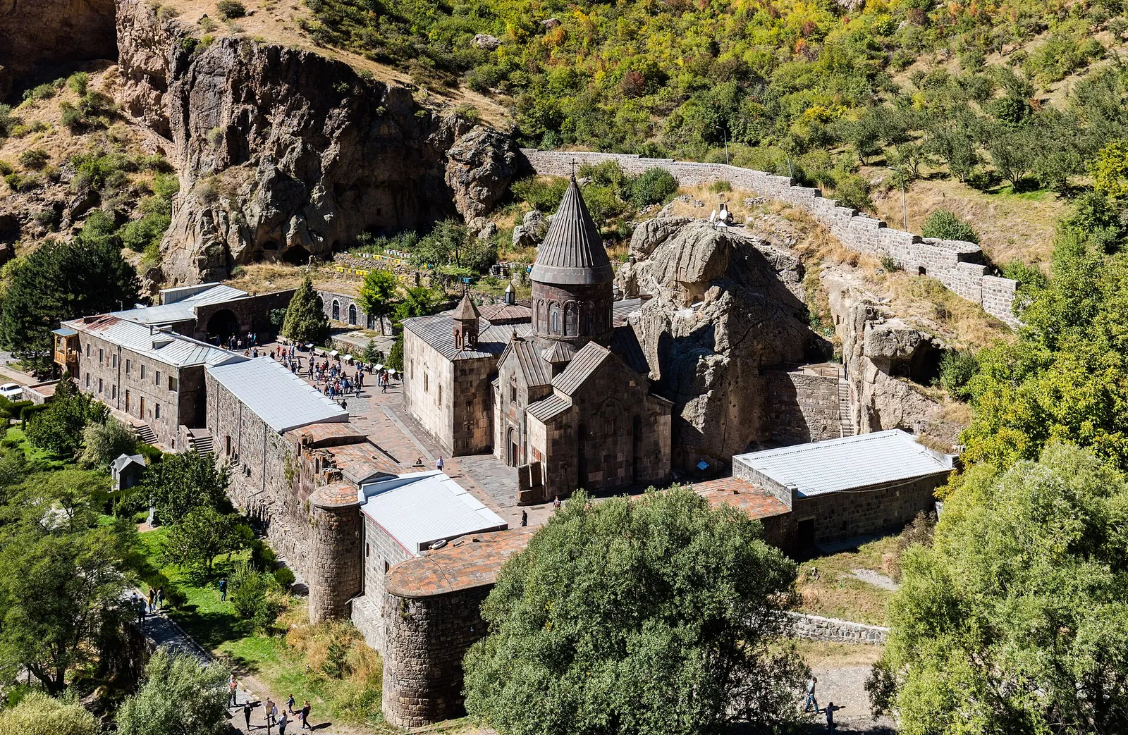Geghard Monastery tucked against the rocky cliffs