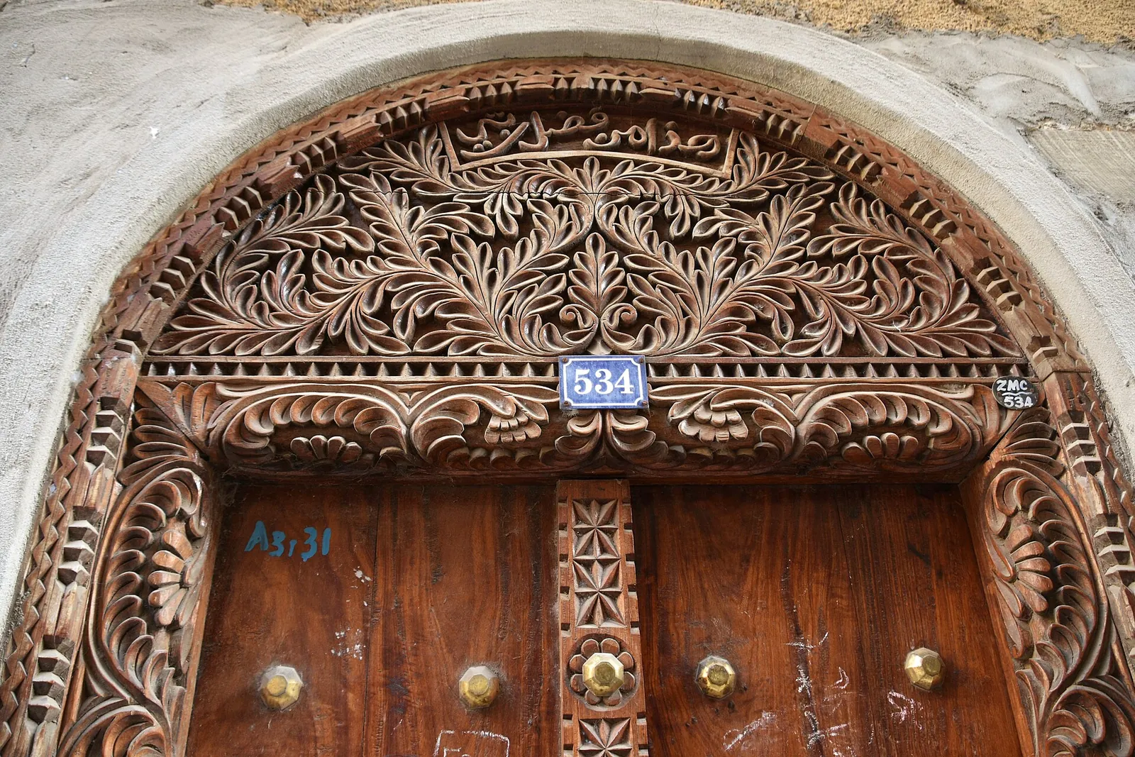 Intricately carved wooden door in Stone Town